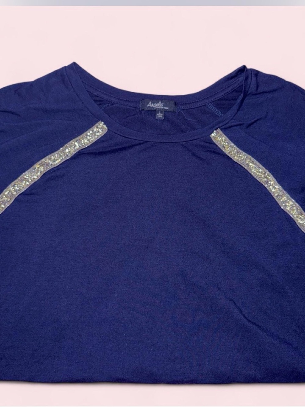 Angels casual navy short-sleeve shirt with gold sequin shoulder accents,